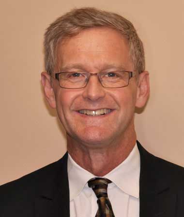 Headshot of male doctor smiling