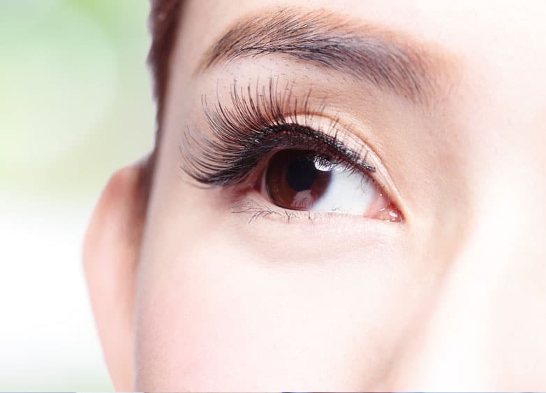 A portrait of the eye of an Asian woman, illustrating what Asian Eyelid Surgery can achieve.